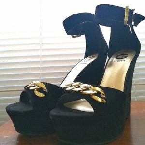 Black and gold guess wedges